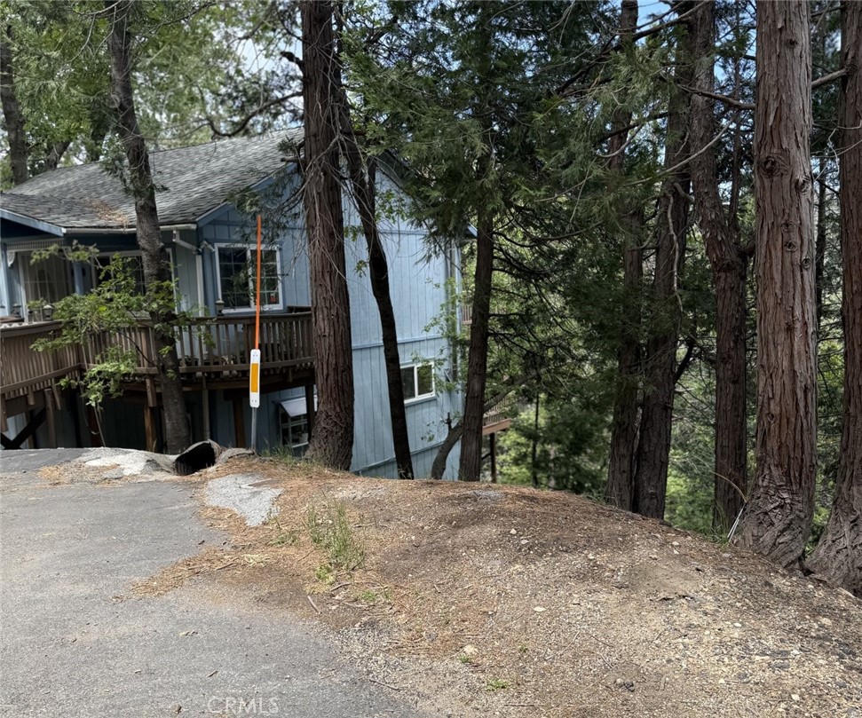 0 Alpine Court Crestline, CA 92325 - Photo 7 of 14 a view of a backyard with large trees