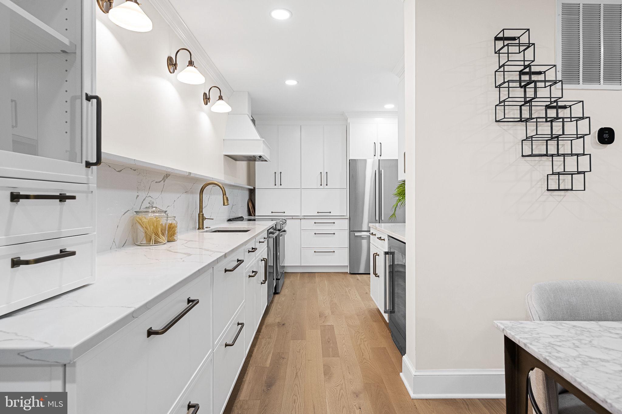 3287 Sutton Place Northwest, Unit D Washington, DC 20016 - Photo 18 of 52 Quartz backsplash with integrated ledge
