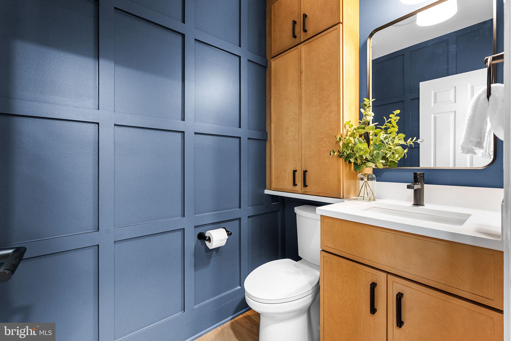 3287 Sutton Place Northwest, Unit D Washington, DC 20016 - Photo 25 of 52 Powder Room with Custom wainscoting and cabinetry