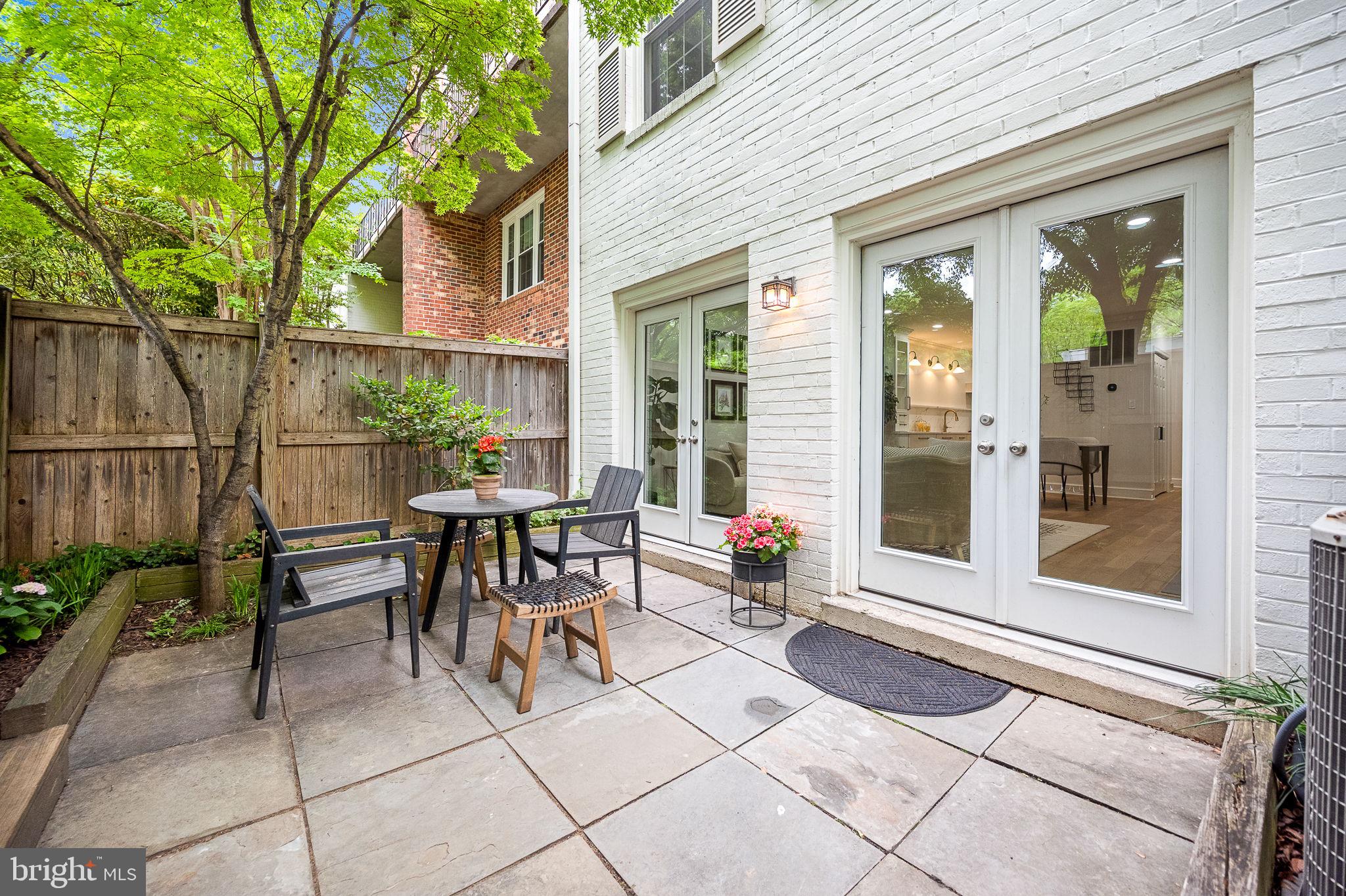 3287 Sutton Place Northwest, Unit D Washington, DC 20016 - Photo 36 of 52 French doors leading to private patio