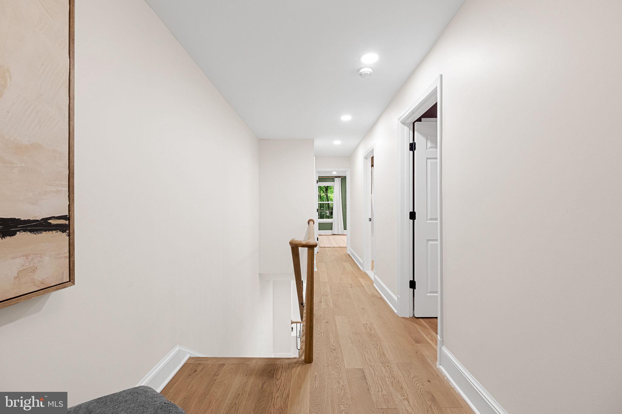 3287 Sutton Place Northwest, Unit D Washington, DC 20016 - Photo 4 of 52 White oak hardwood flooring throughout