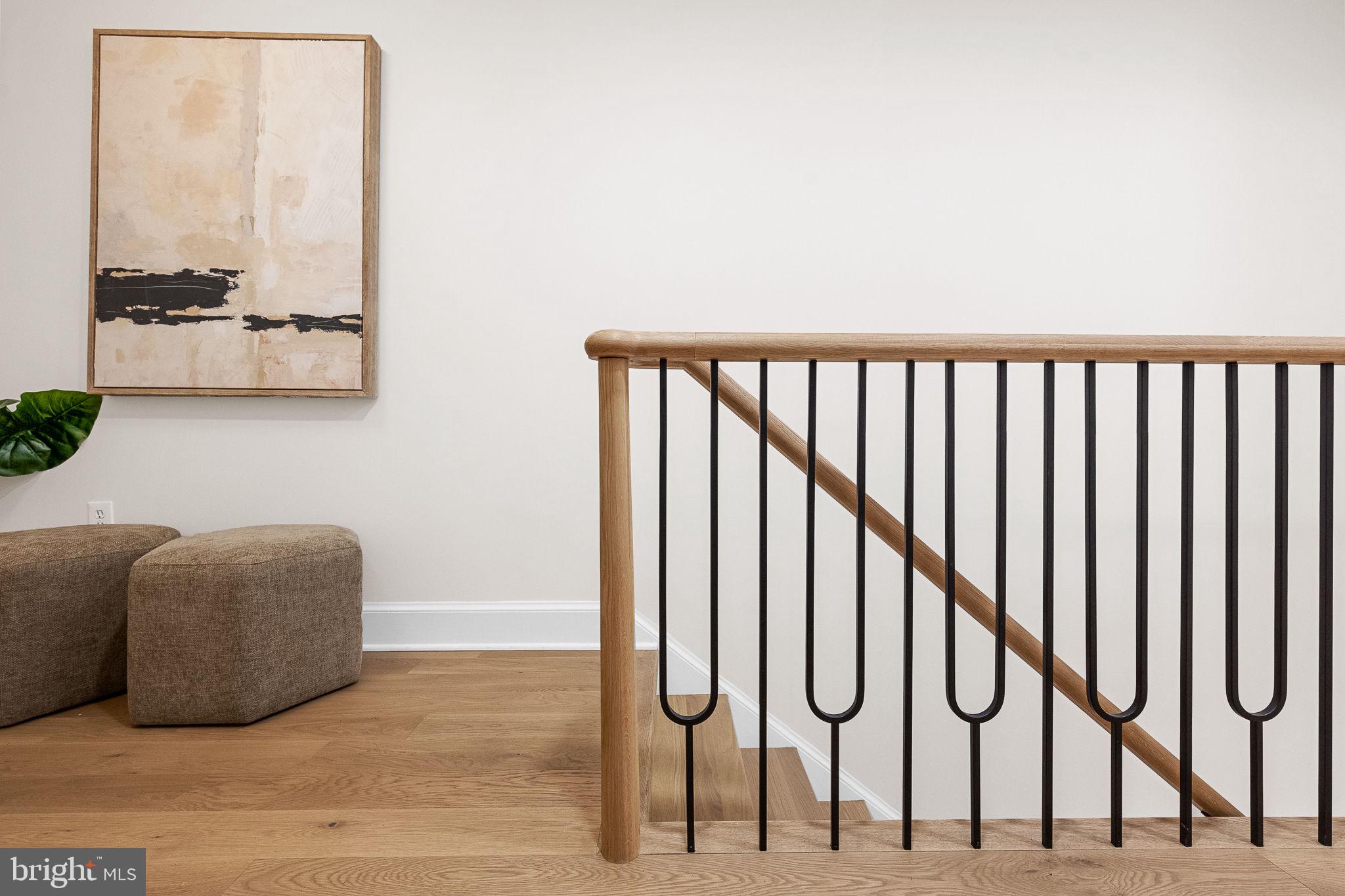 3287 Sutton Place Northwest, Unit D Washington, DC 20016 - Photo 5 of 52 Custom white oak and iron stair railing