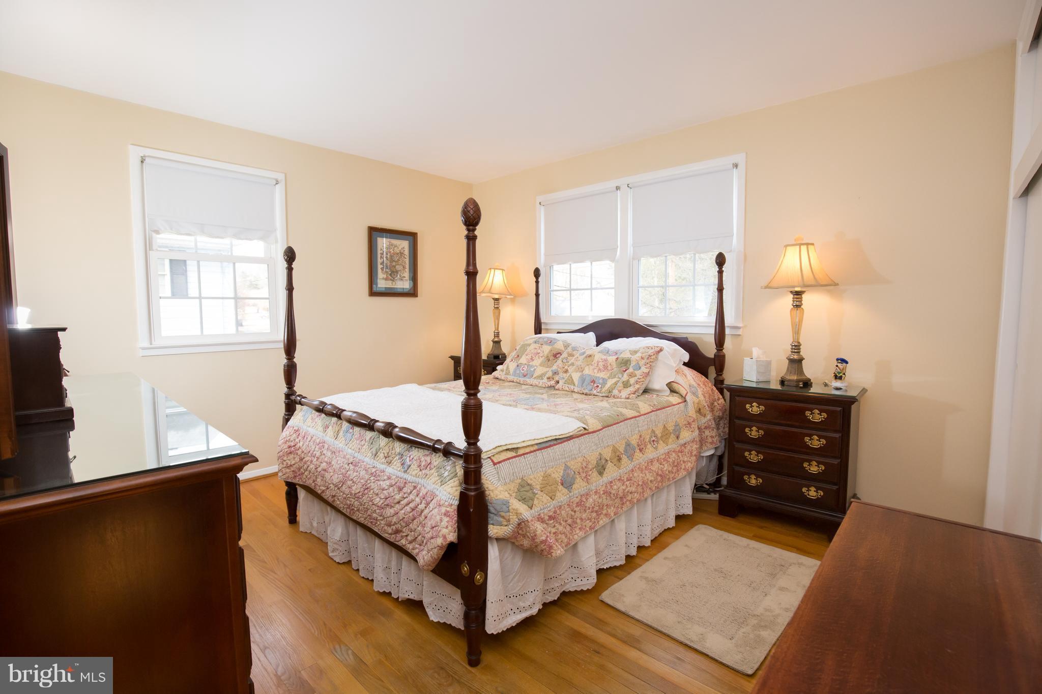 5227 Milland Street Springfield, VA 22151 - Photo 17 of 28 a bedroom with a bed and window