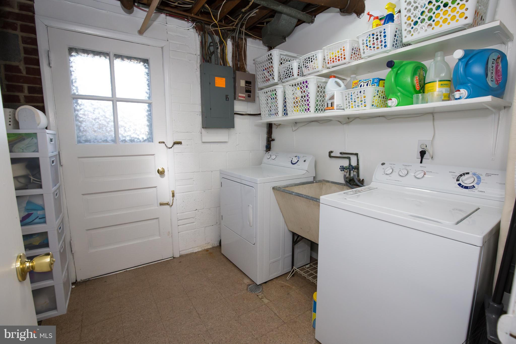 5227 Milland Street Springfield, VA 22151 - Photo 24 of 28 a utility room with dryer and washer