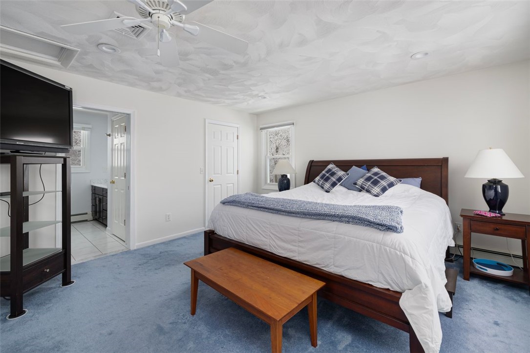 117 Moccasin Trail Cranston, RI 02921 - Photo 16 of 43 Primary Bedroom - Southern facing Primary suite is spacious with plenty of space for your furniture. Room dimension 21 X 14.3