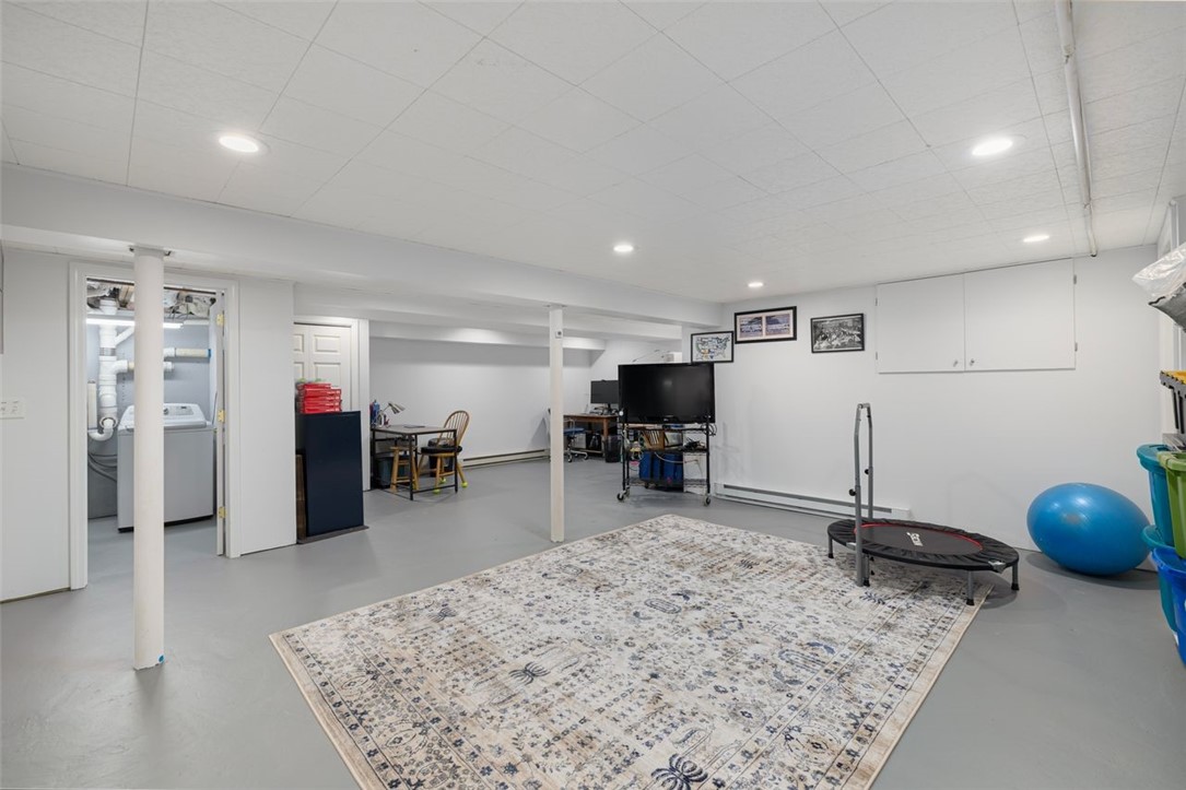 117 Moccasin Trail Cranston, RI 02921 - Photo 27 of 43 Basement - Immaculate lower level flex room ready for your hobbies, home office or recreational room. Room dimensions 22.4 X 25.7