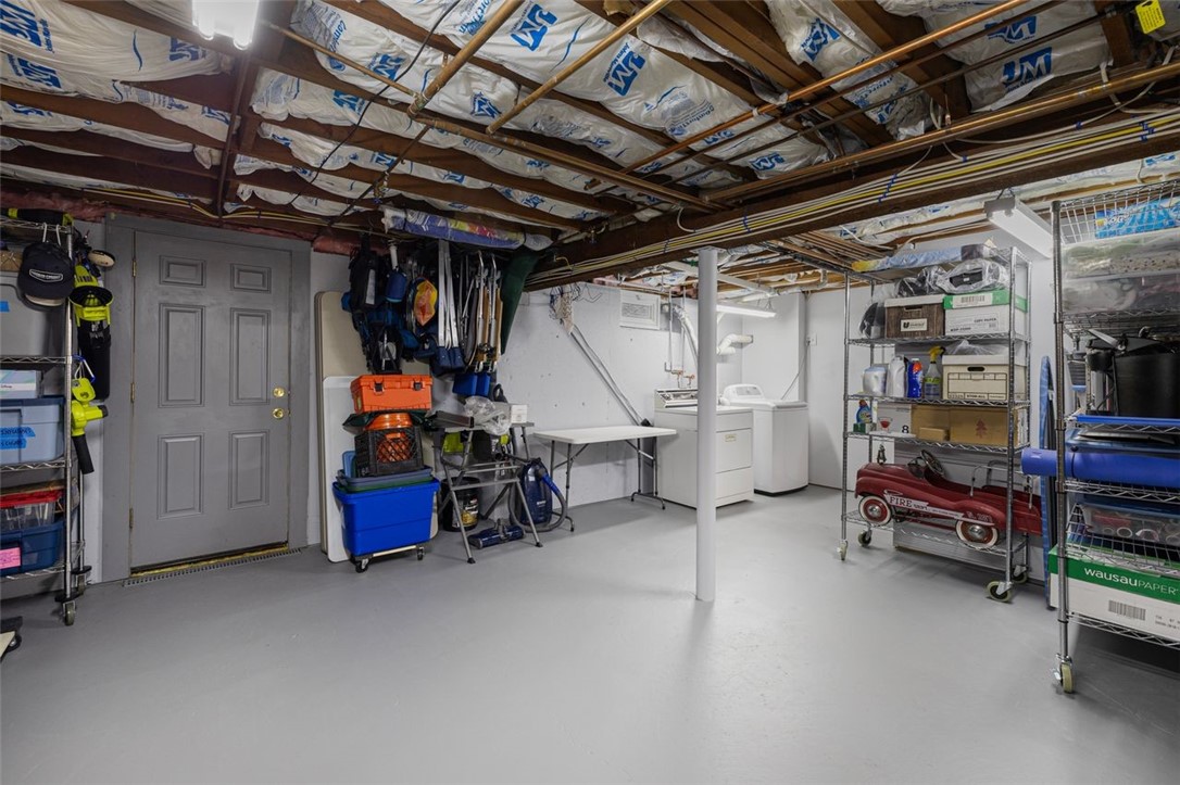 117 Moccasin Trail Cranston, RI 02921 - Photo 31 of 43 Basement - Lower level storage room with access to the back yard bulk head. Room dimensions 22.5 X 33.4
