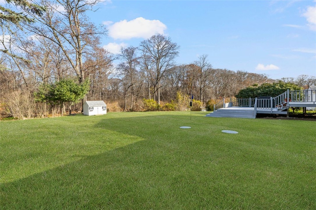 117 Moccasin Trail Cranston, RI 02921 - Photo 36 of 43 Yard - Private manicured back yard with shed for additional storage.
