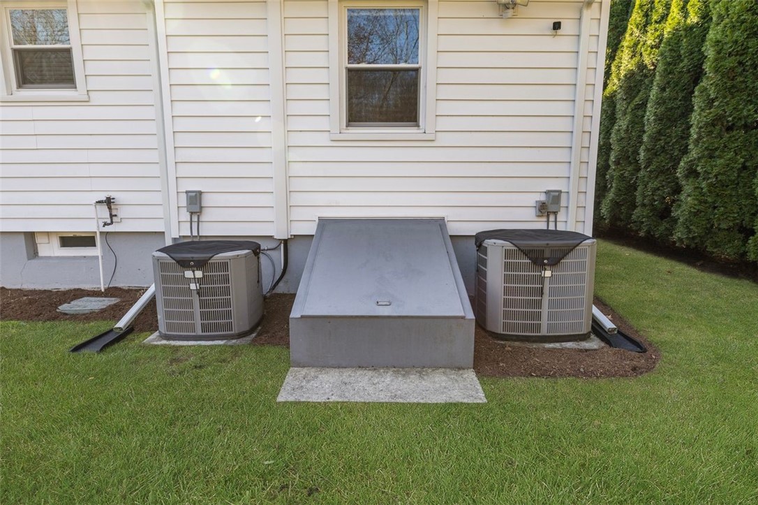 117 Moccasin Trail Cranston, RI 02921 - Photo 39 of 43 Back of Structure - Bulkhead with access to the basement allowing easy access to the lower level.