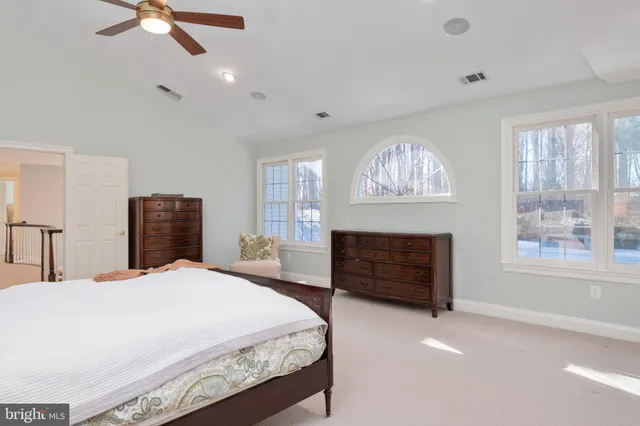 a front view of a house with yard