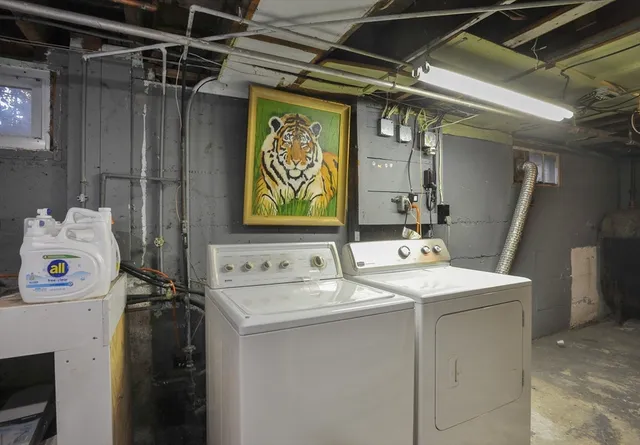 a utility room with dryer and washer