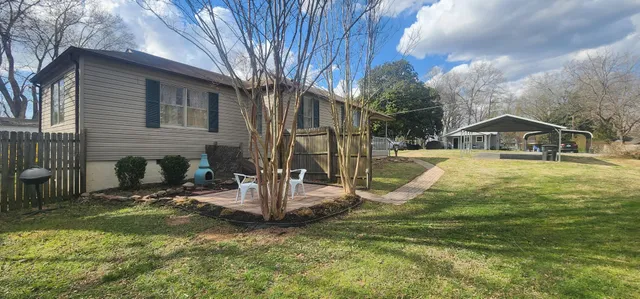 a view of a house with swimming pool