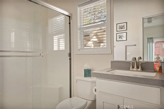 a dining room with a window and furniture
