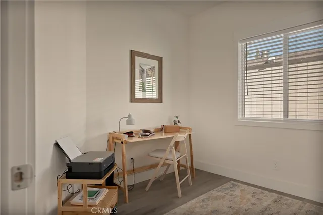 a view of a hallway with front door