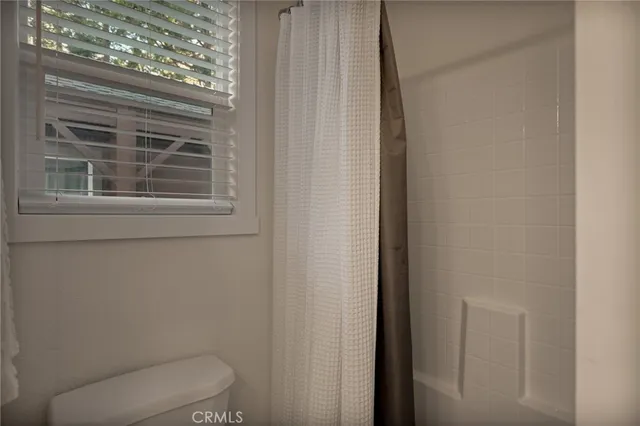 a view of house with deck