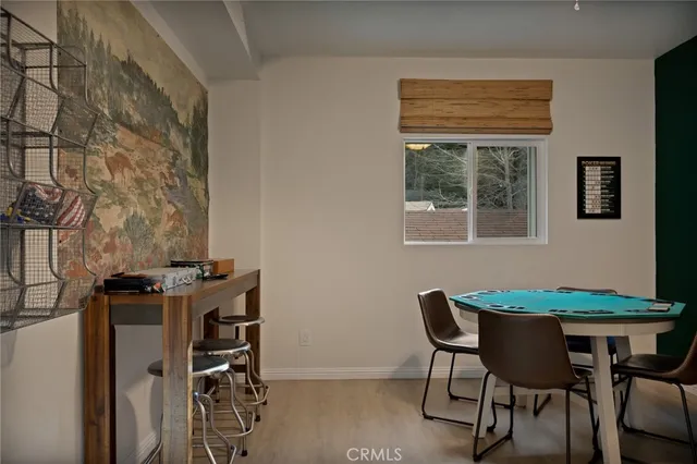 a bathroom with a sink vanity mirror and toilet