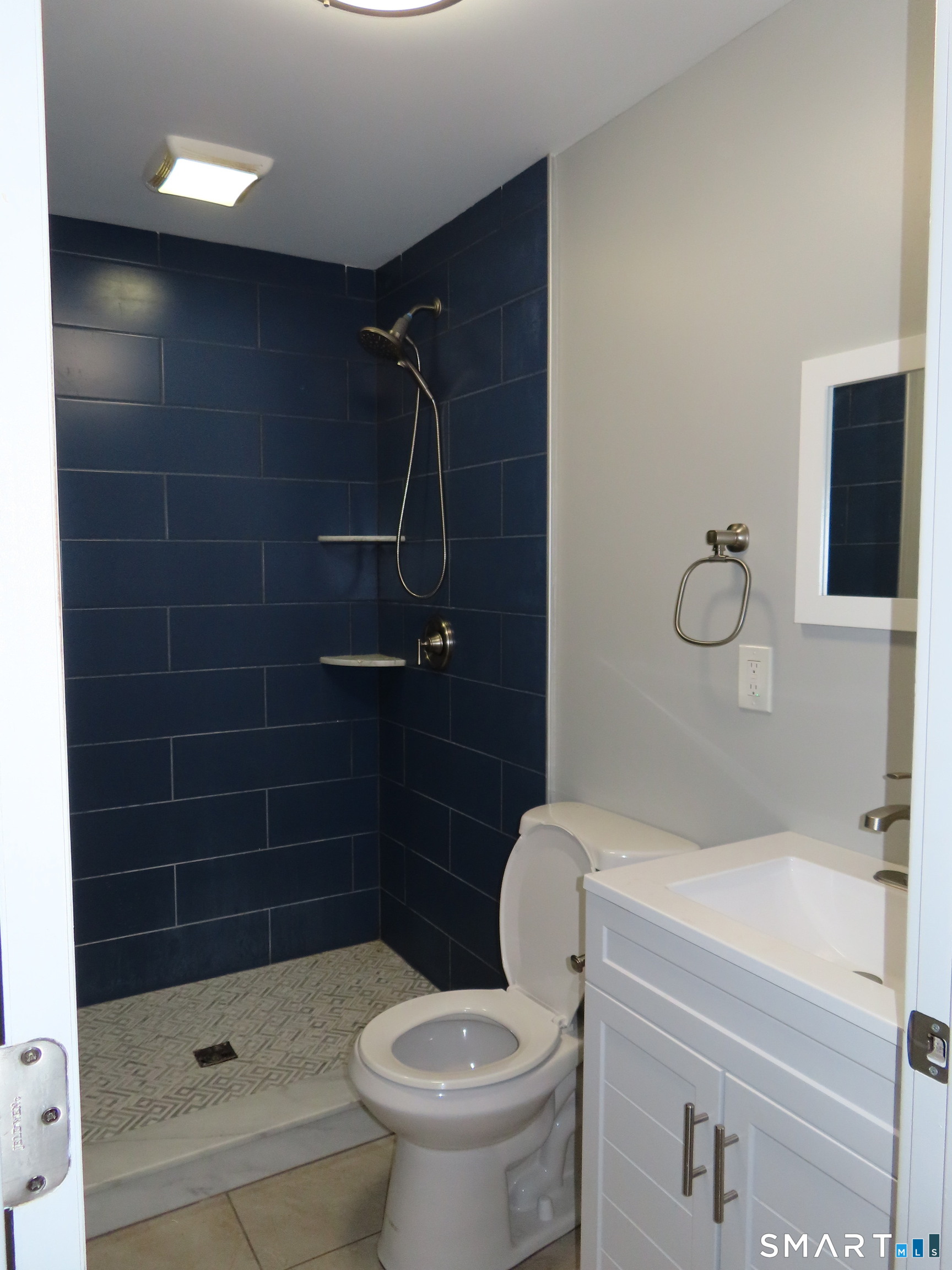 40 Winter Street Ansonia, CT 06401 - Photo 11 of 24 a bathroom with a toilet and a shower