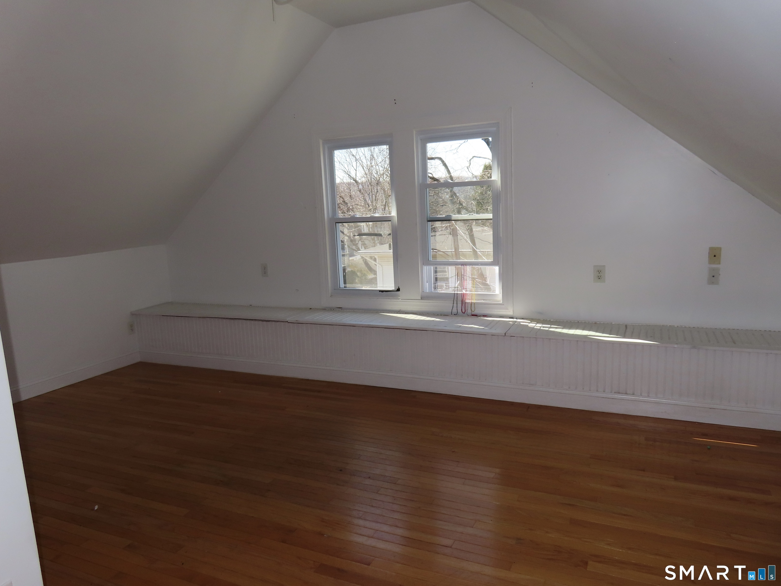 40 Winter Street Ansonia, CT 06401 - Photo 20 of 24 wooden floor in an empty room with a window