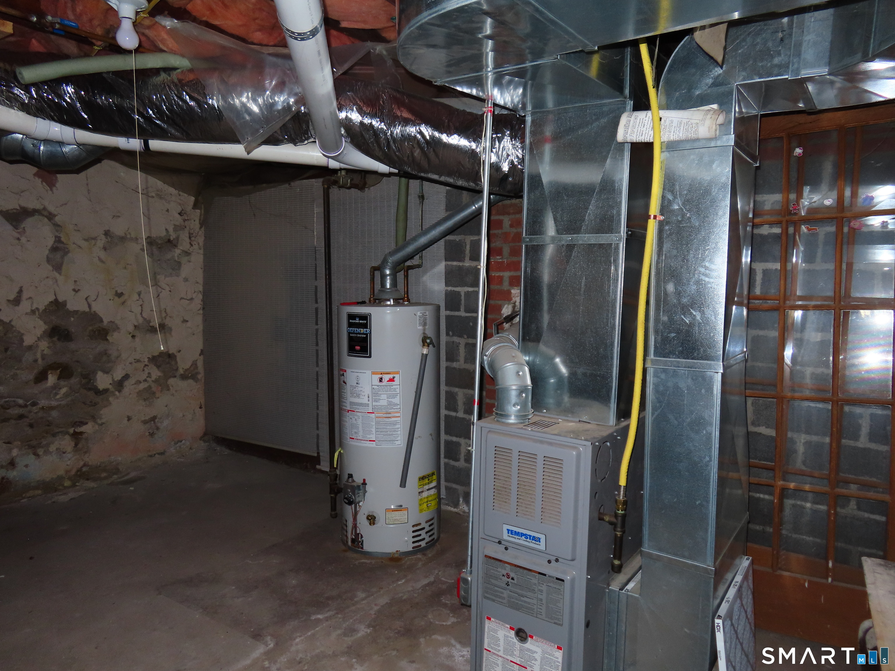 40 Winter Street Ansonia, CT 06401 - Photo 22 of 24 a close view of water heater room