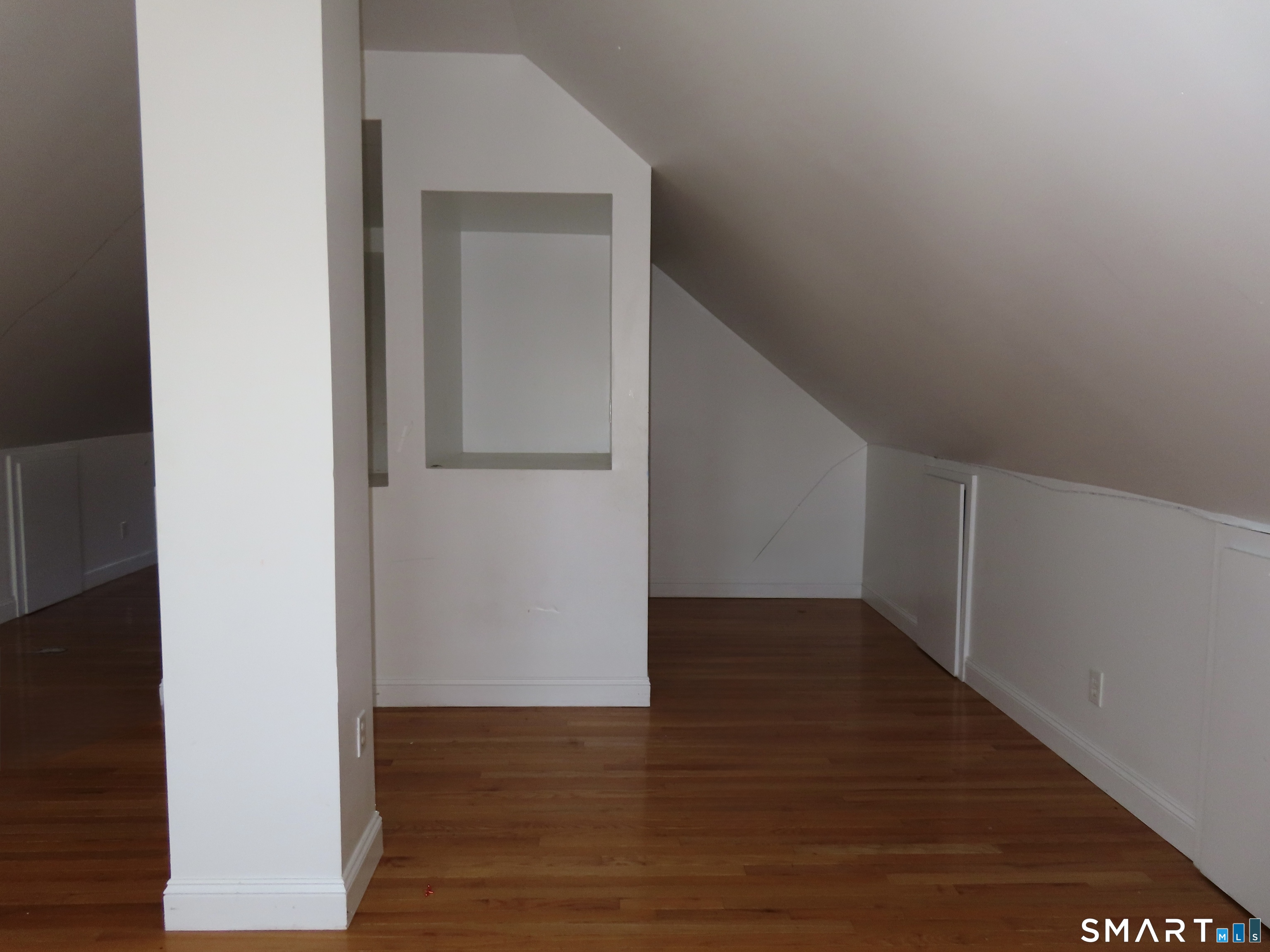 40 Winter Street Ansonia, CT 06401 - Photo 23 of 24 a view of a hallway with wooden floor