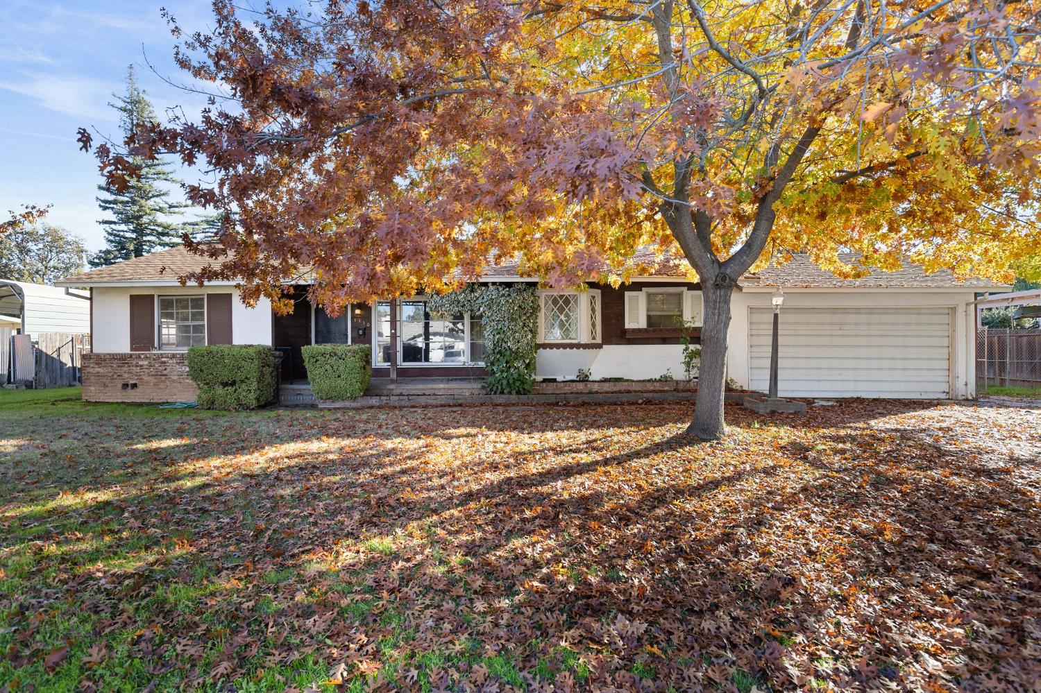 a house with trees in front of it