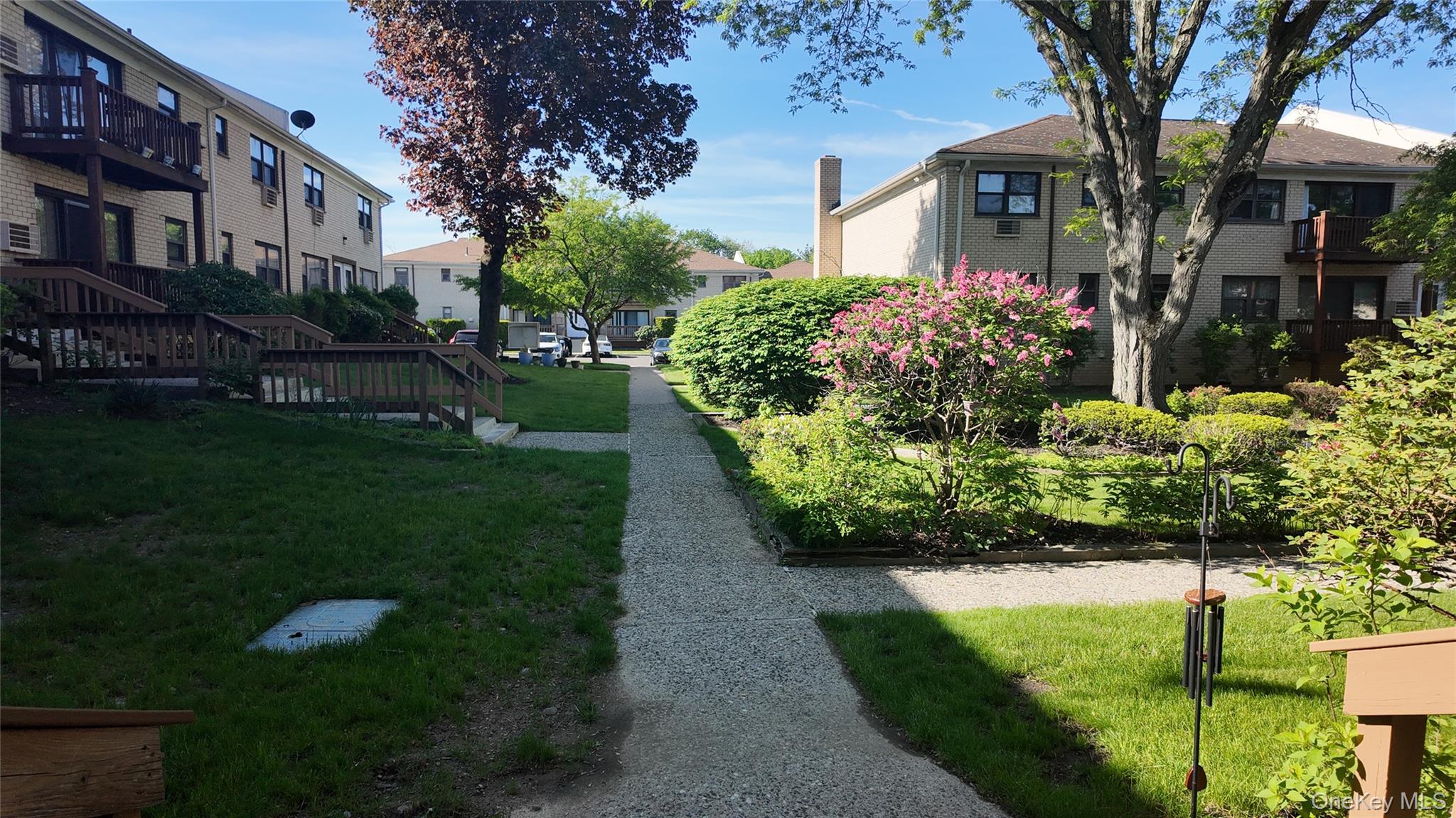 80 Sneden Place, Unit 80 Spring Valley, NY 10977 - Photo 3 of 11 Surrounding community with a residential view and a yard