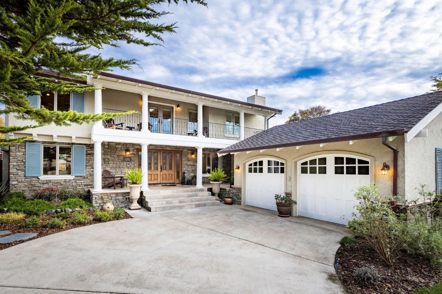a front view of a building with many windows