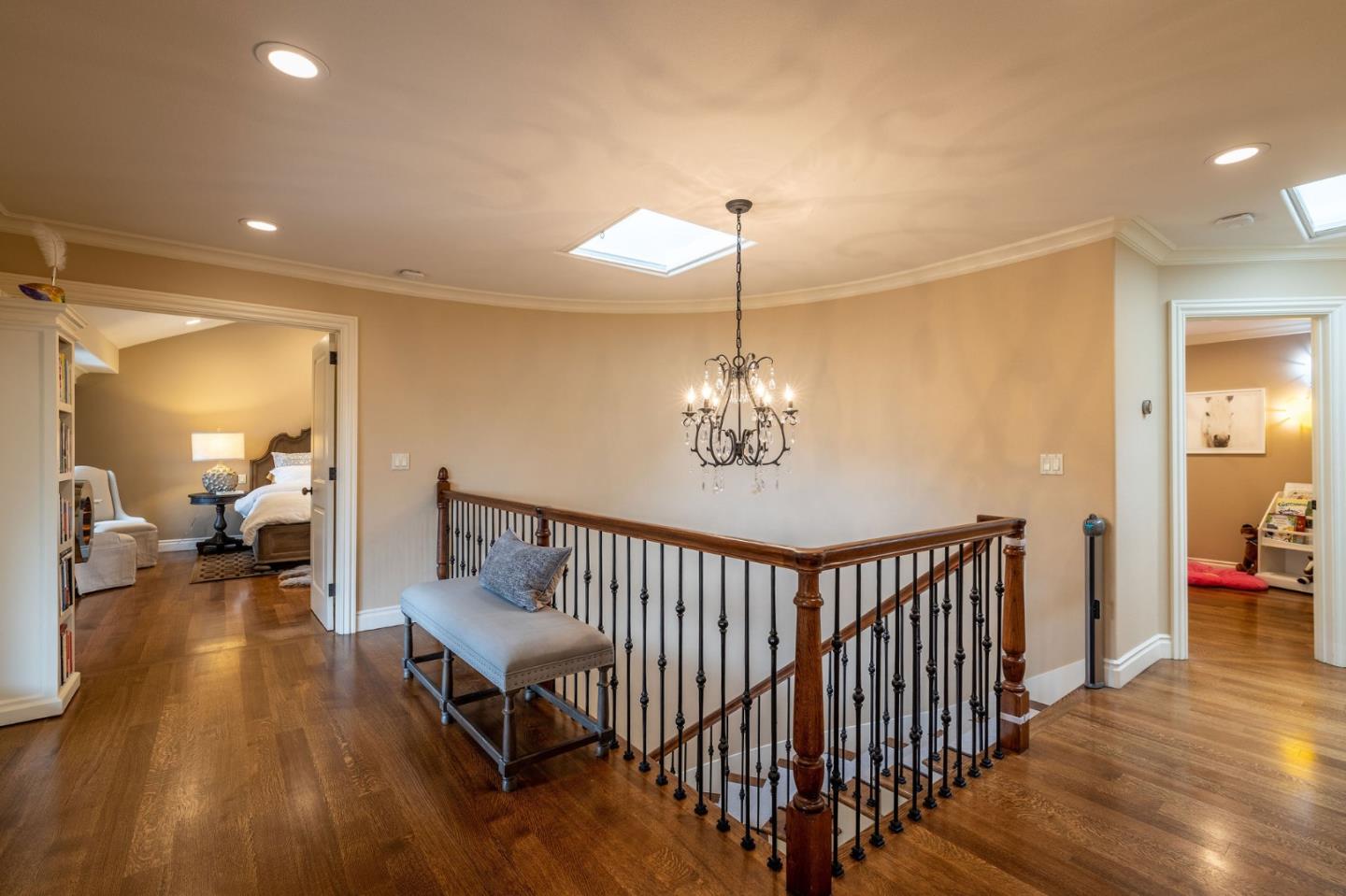 2107 Winged Foot Road Half Moon Bay, CA 94019 - Photo 12 of 29 a living room with furniture and a chandelier