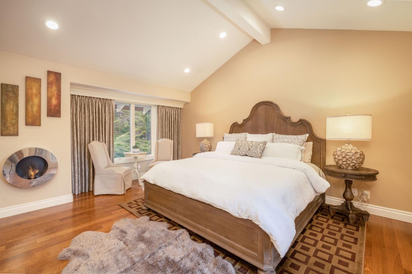2107 Winged Foot Road Half Moon Bay, CA 94019 - Photo 13 of 29 a bedroom with a bed and a window