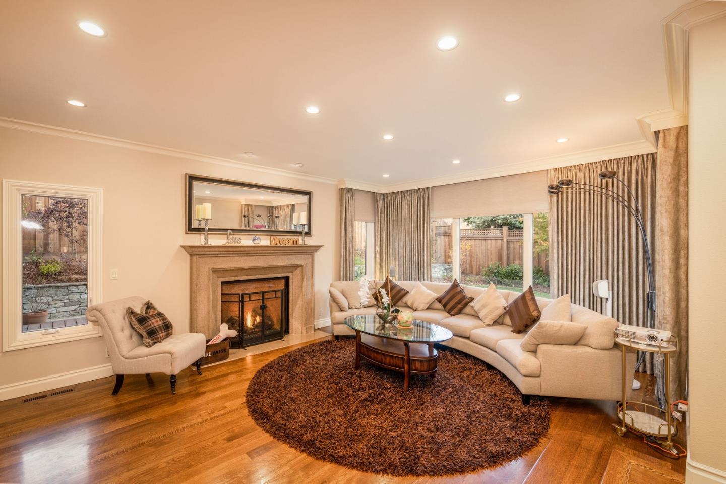 2107 Winged Foot Road Half Moon Bay, CA 94019 - Photo 4 of 29 a living room with furniture fireplace and window
