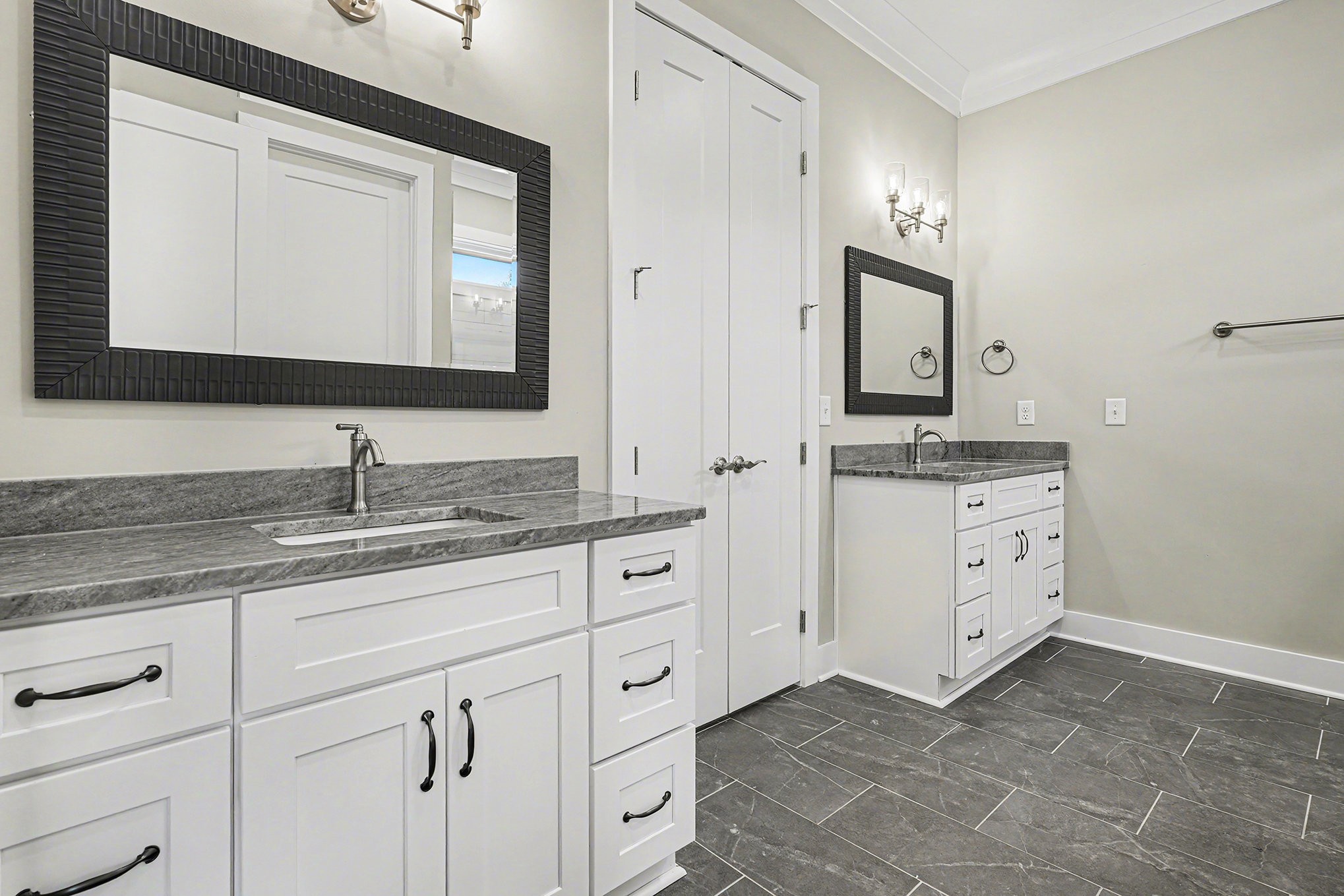 412 Harsh Lane Castalian Springs, TN 37031 - Photo 23 of 36 a bathroom with double sink and a mirror