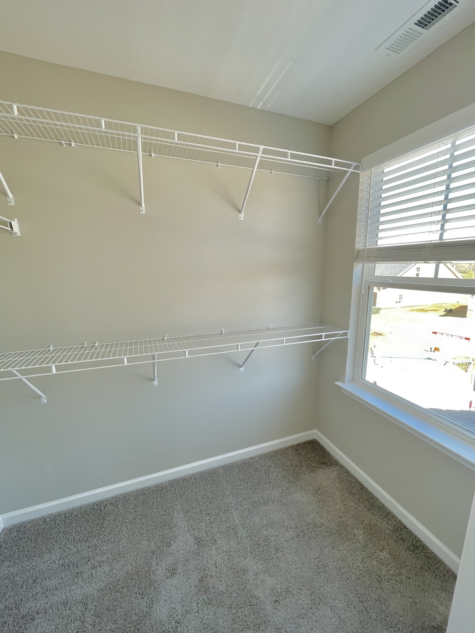 147 Addi Street Pleasant View, TN 37146 - Photo 8 of 13 a view of a room with racks on the wall
