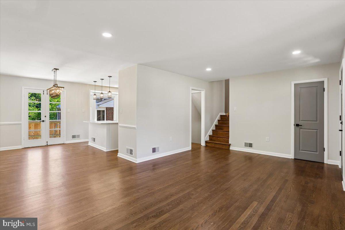 10701 Brunswick Avenue Silver Spring, MD 20902 - Photo 6 of 50 Living Room Flows into the Dining Room