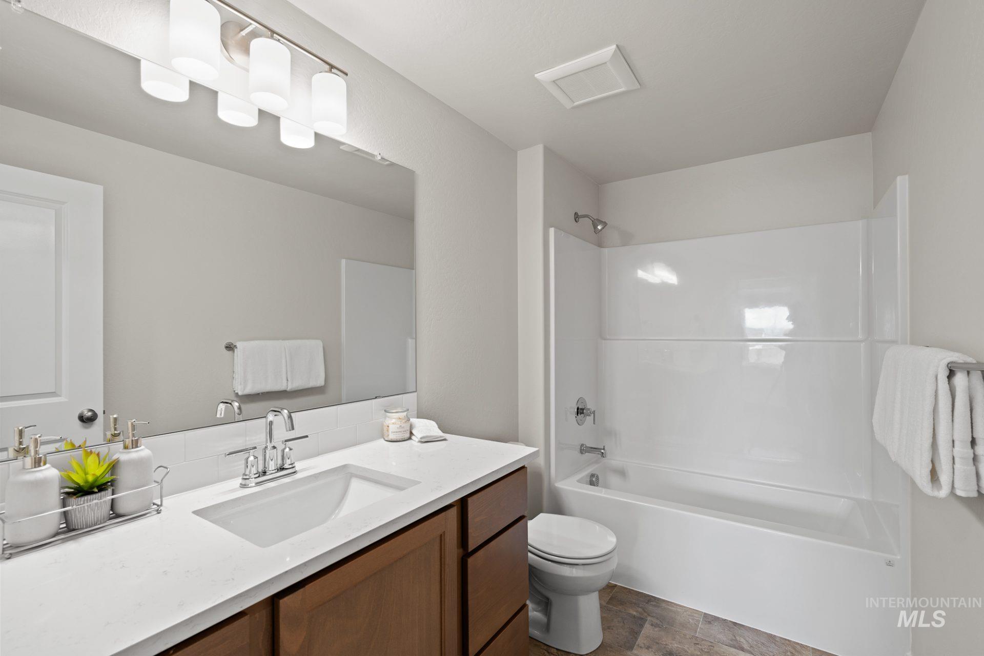 868 Adamite Road Kimberly, ID 83341 - Photo 5 of 22 Full bathroom featuring tub / shower combination and vanity