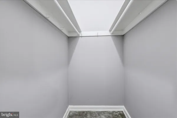 a view of small space with racks on the wall