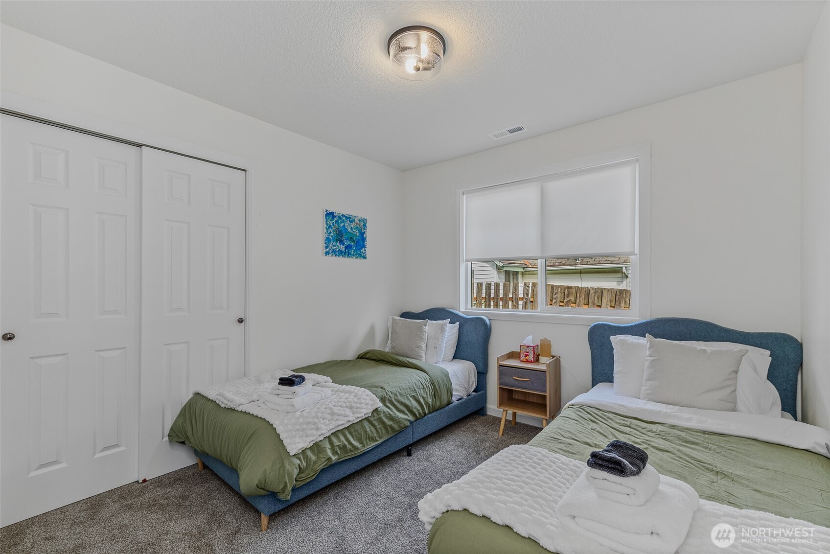 461 Northwest Jefferson Street Stevenson, WA 98648 - Photo 14 of 38 a bedroom with furniture and a window