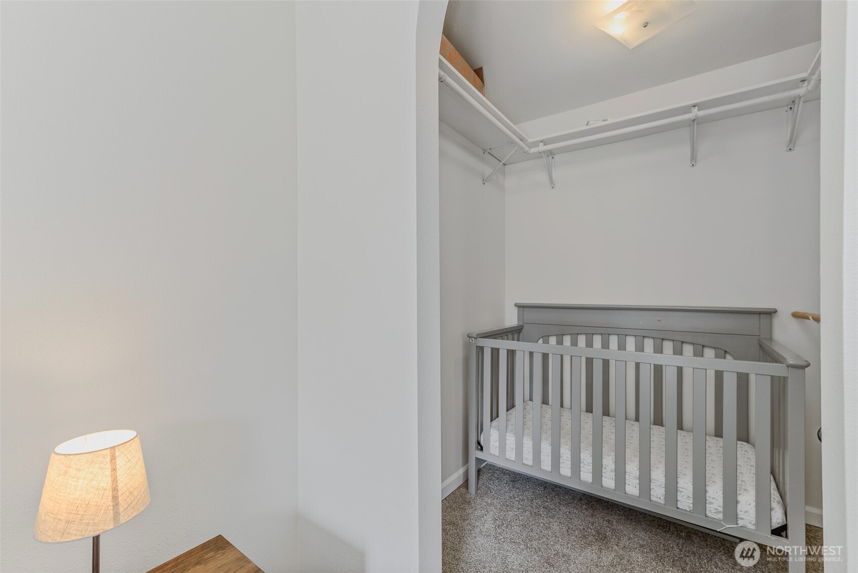 461 Northwest Jefferson Street Stevenson, WA 98648 - Photo 23 of 38 a view of a room with a baby crib and a window
