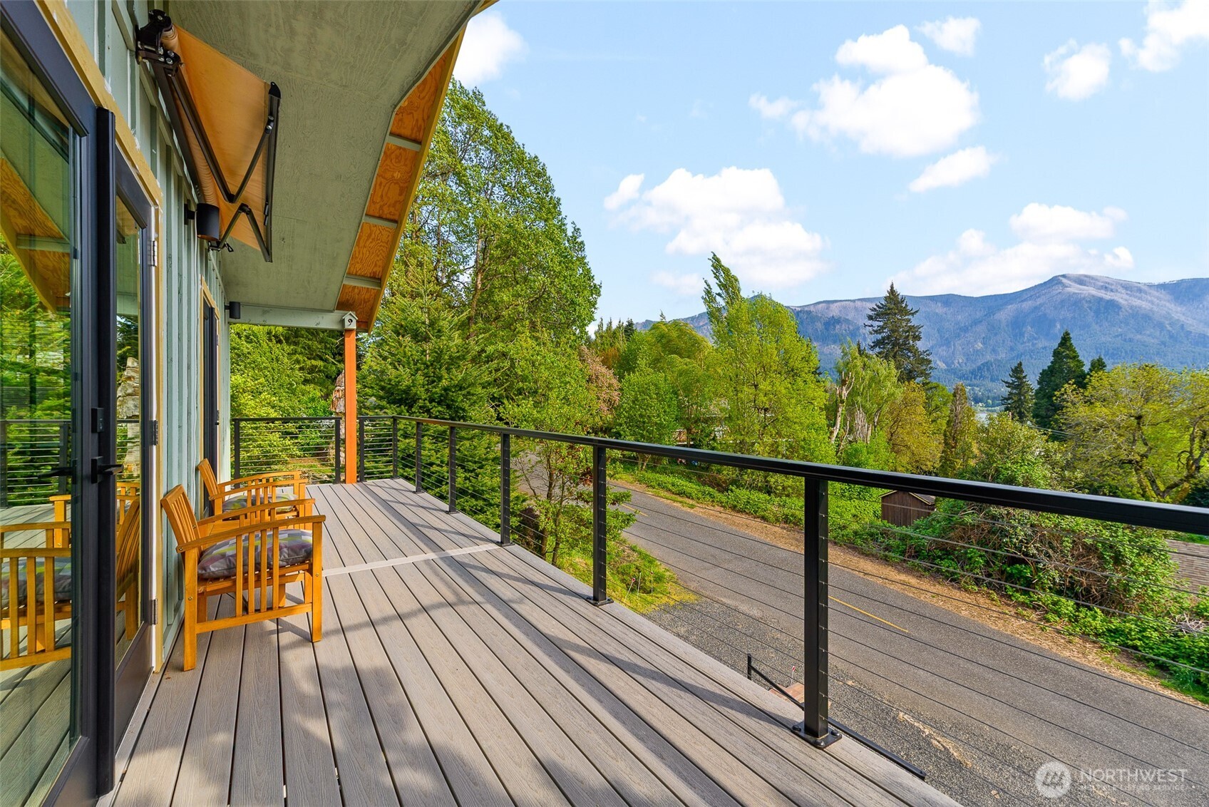 461 Northwest Jefferson Street Stevenson, WA 98648 - Photo 27 of 38 a view of balcony with wooden floor and fence
