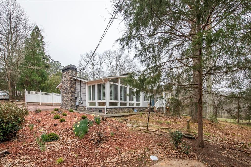 3819 Mason Creek Road Winston, GA 30187 - Photo 38 of 54 a house with a yard