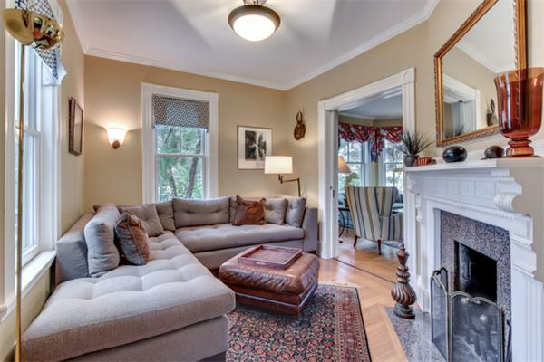 27 Percy Road Lexington, MA 02421 - Photo 5 of 17 a living room with furniture and a fireplace