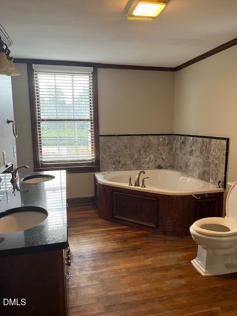 6663 Harold Obrien Road Oxford, NC 27565 - Photo 11 of 41 a bathroom with a granite countertop bathtub sink vanity mirror and toilet