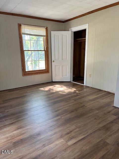 6663 Harold Obrien Road Oxford, NC 27565 - Photo 30 of 41 an empty room with wooden floor and windows