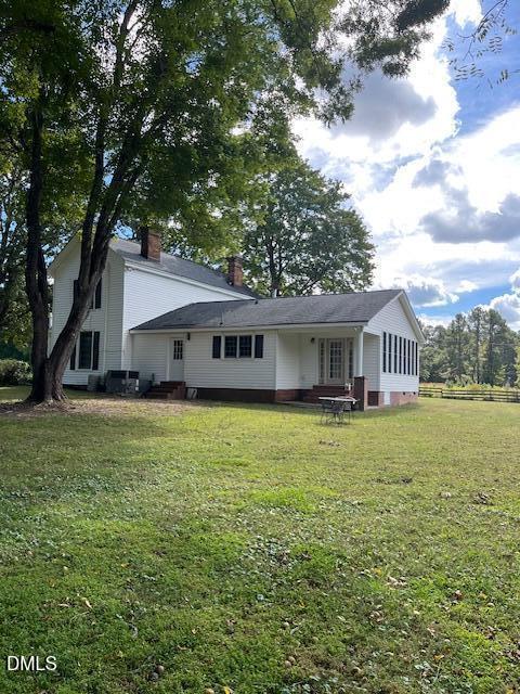 6663 Harold Obrien Road Oxford, NC 27565 - Photo 35 of 41 a front view of a house with garden