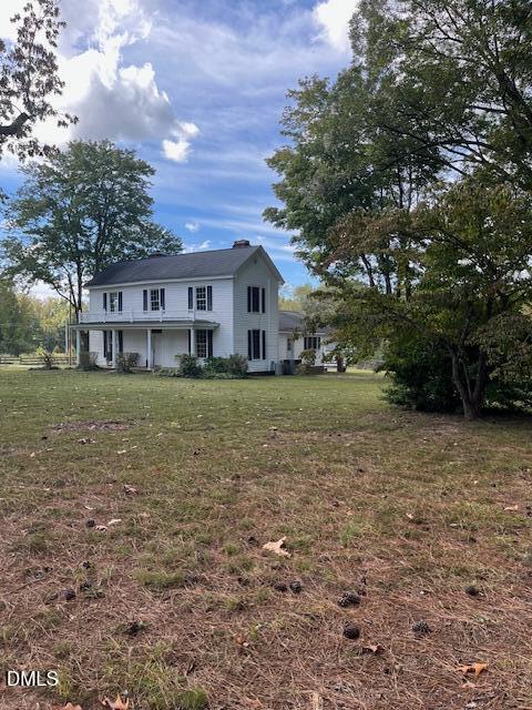 6663 Harold Obrien Road Oxford, NC 27565 - Photo 41 of 41 a view of a house with a yard