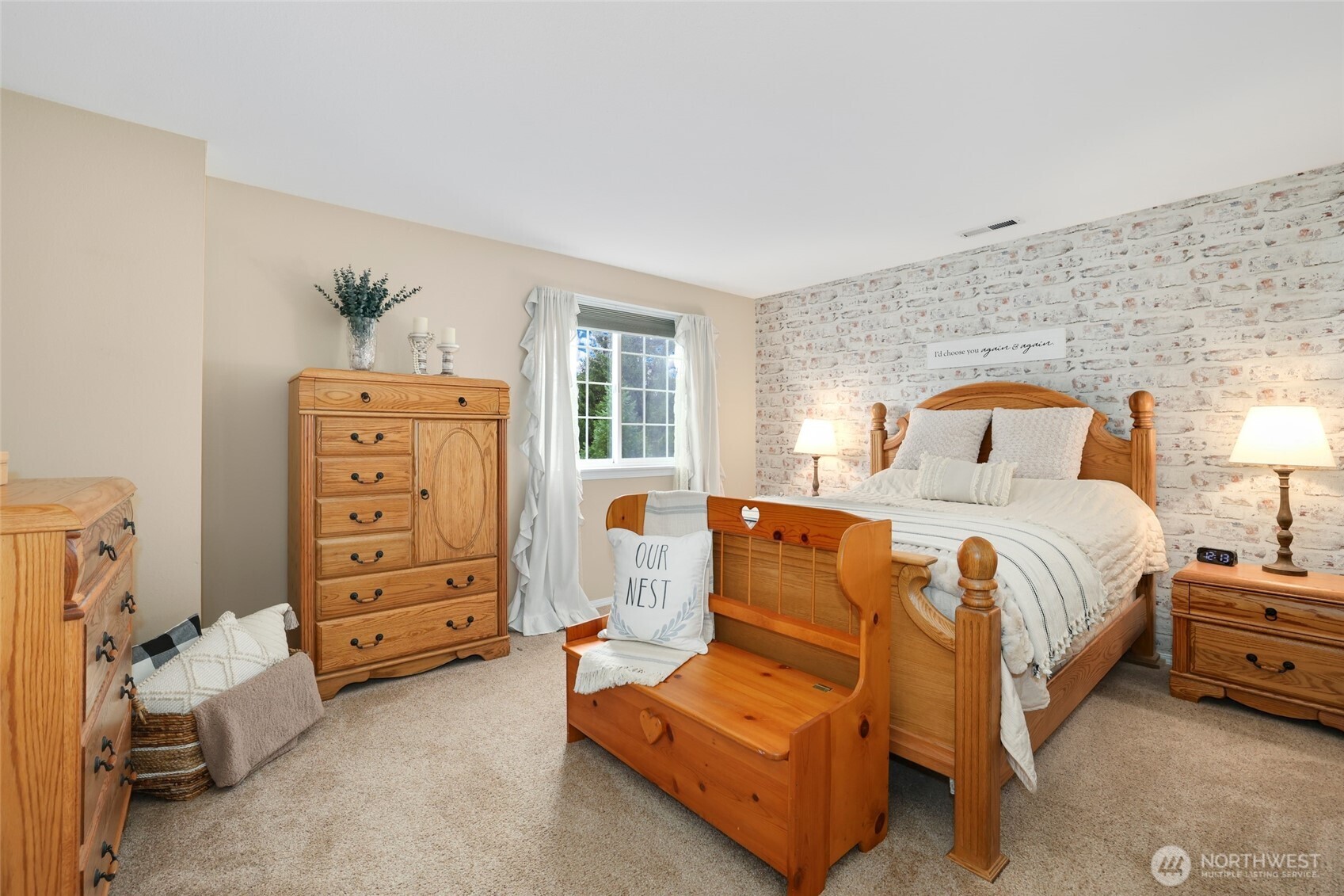 12722 247th Street East Graham, WA 98338 - Photo 20 of 40 a bedroom with a bed and a cabinets