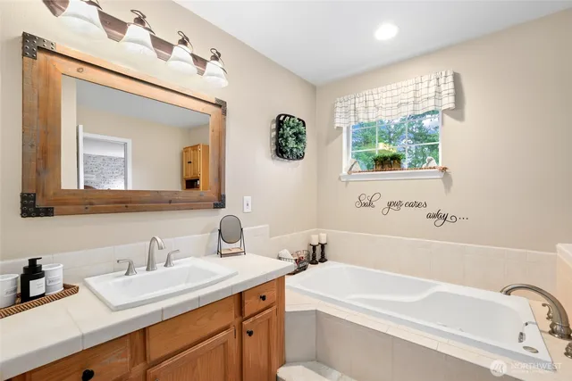 a bathroom with a sink and a bathtub