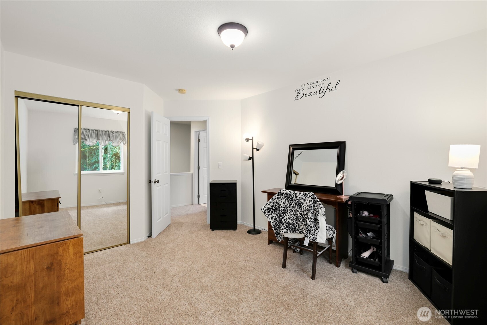 12722 247th Street East Graham, WA 98338 - Photo 28 of 40 a bedroom with furniture and a dresser