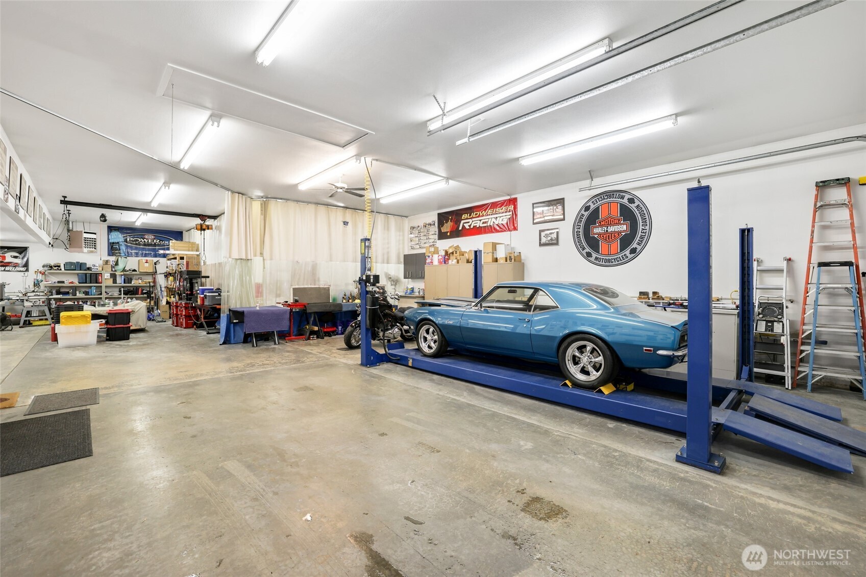 12722 247th Street East Graham, WA 98338 - Photo 29 of 40 a view of a garage with furniture