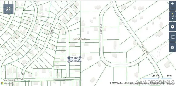 a picture of a bathroom with a white door