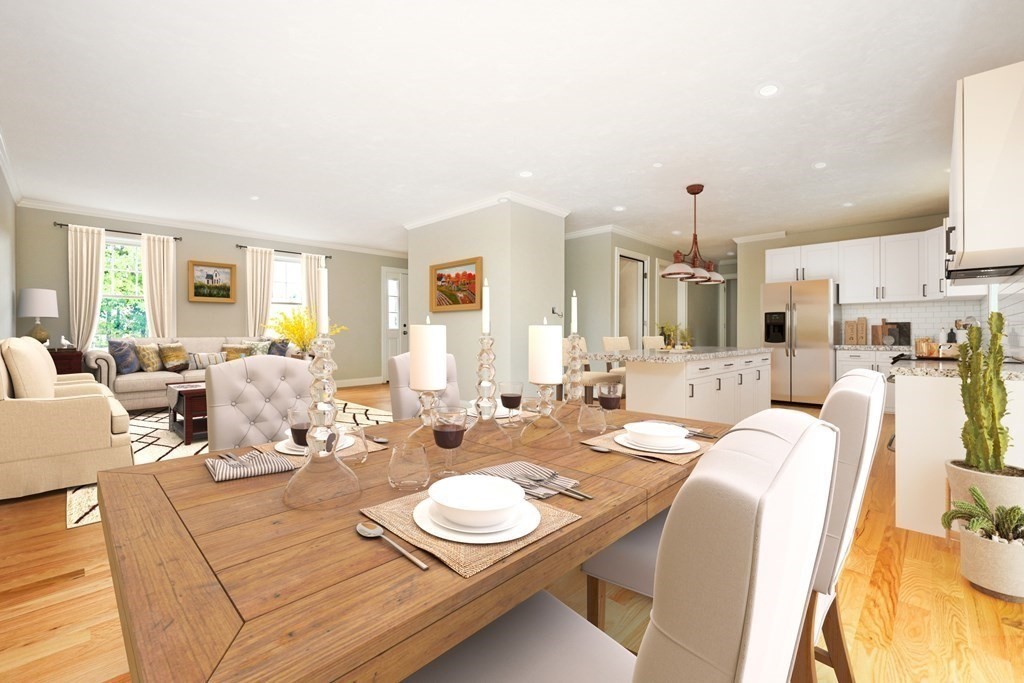 183 Rangeway Road Billerica, MA 01862 - Photo 3 of 14 a living room with lots of white furniture and a table